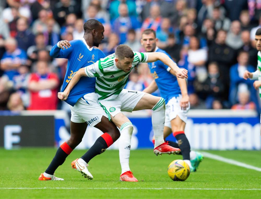 Celtic and Rangers battling on the pitch