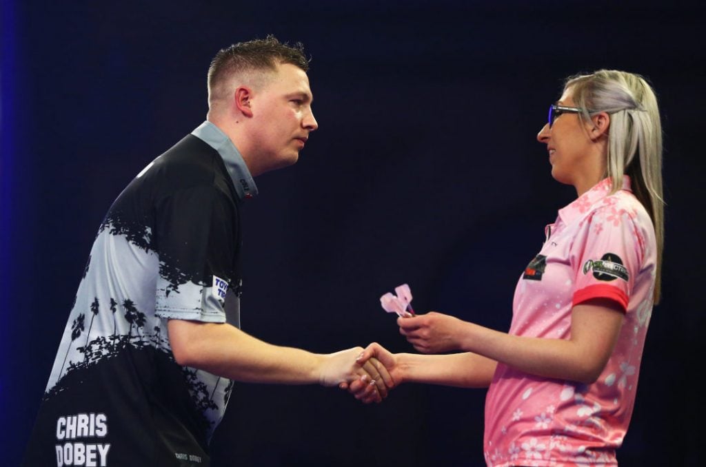 Chris Dobey shaking hands with Fallon Sherrock