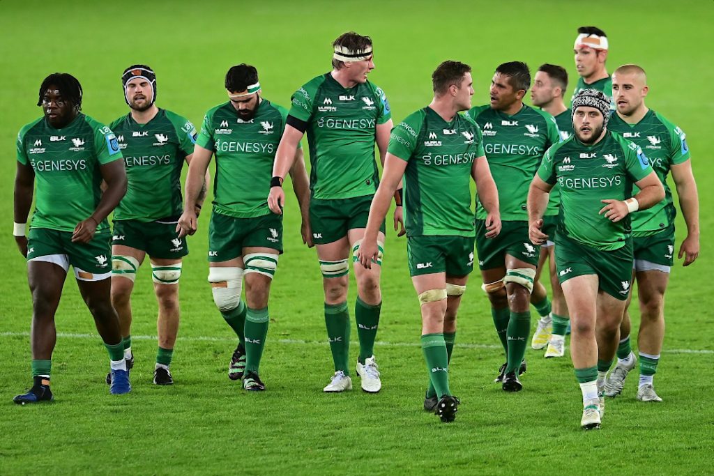 Ten members of the Connacht Rugby Team warming up
