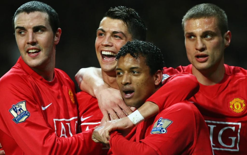 John O’Shea celebrating with his Manchester United teammates