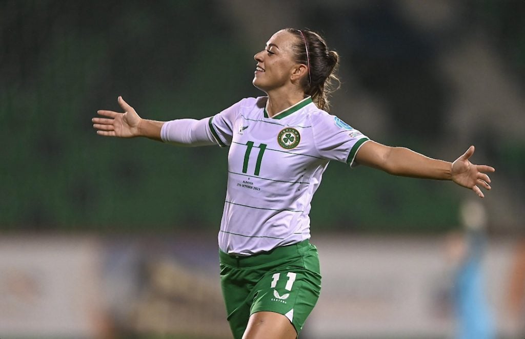 Ireland Women's soccer captain Katie McCabe with her arms out celebrating