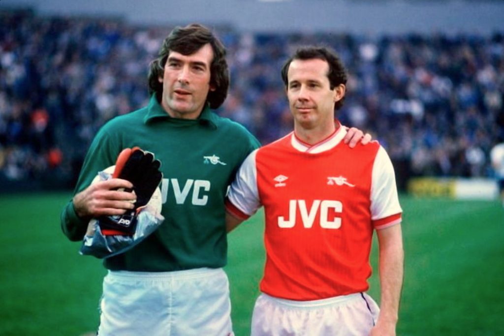 Liam Brady and Pat Jennings pose for a photo during a testimonial