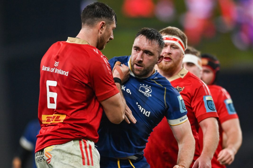 Munster players surround a Leinster player