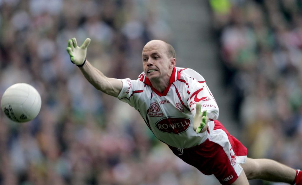 Peter Canavan diving for the football