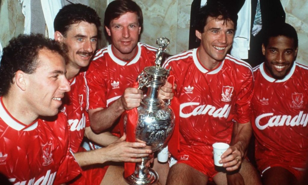 Ronnie Whelan celebrating with Liverpool legends