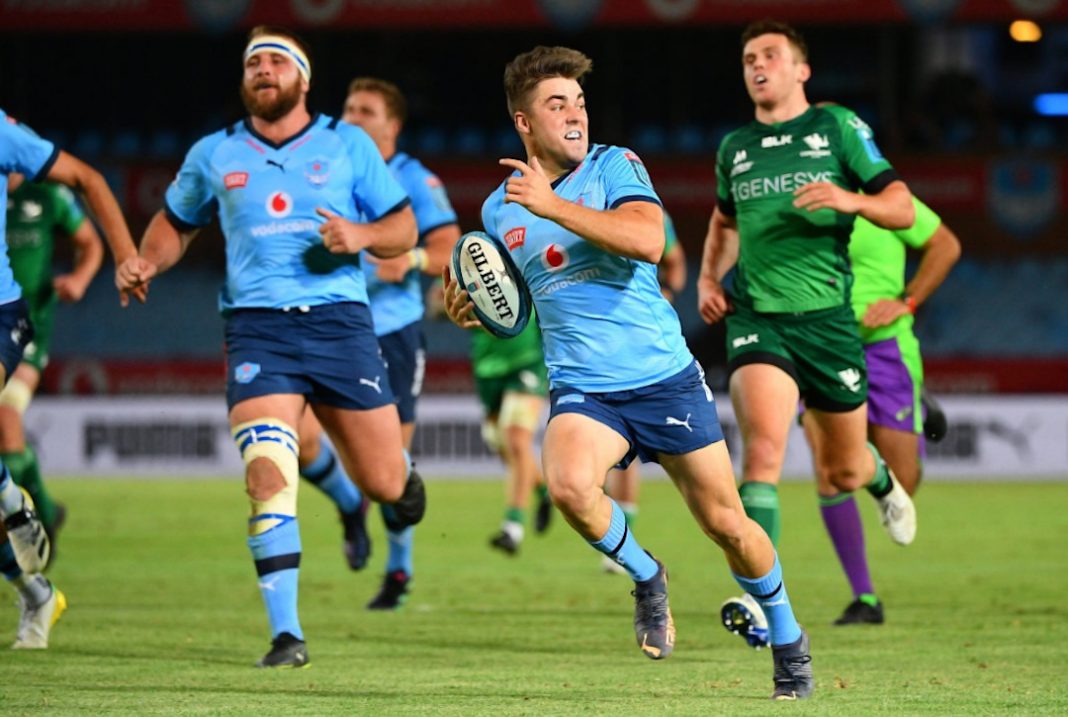 Bulls Rugby player running with the ball in a game