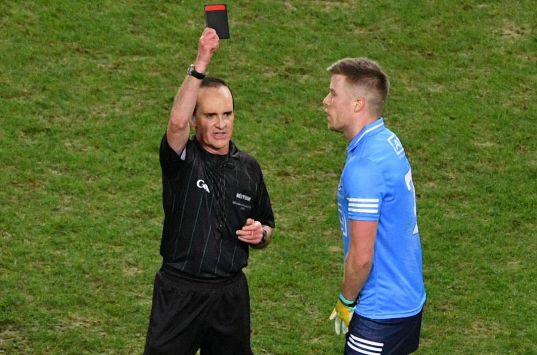 GAA referee handing out a black card