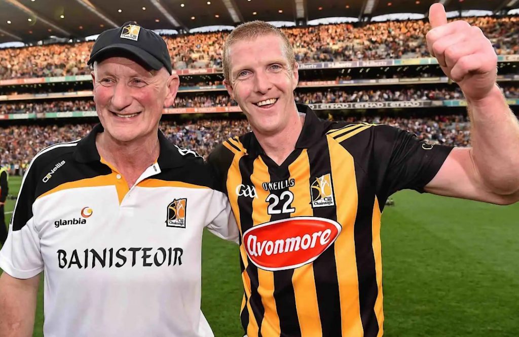 Henry Shefflin smiling with his coach after a win