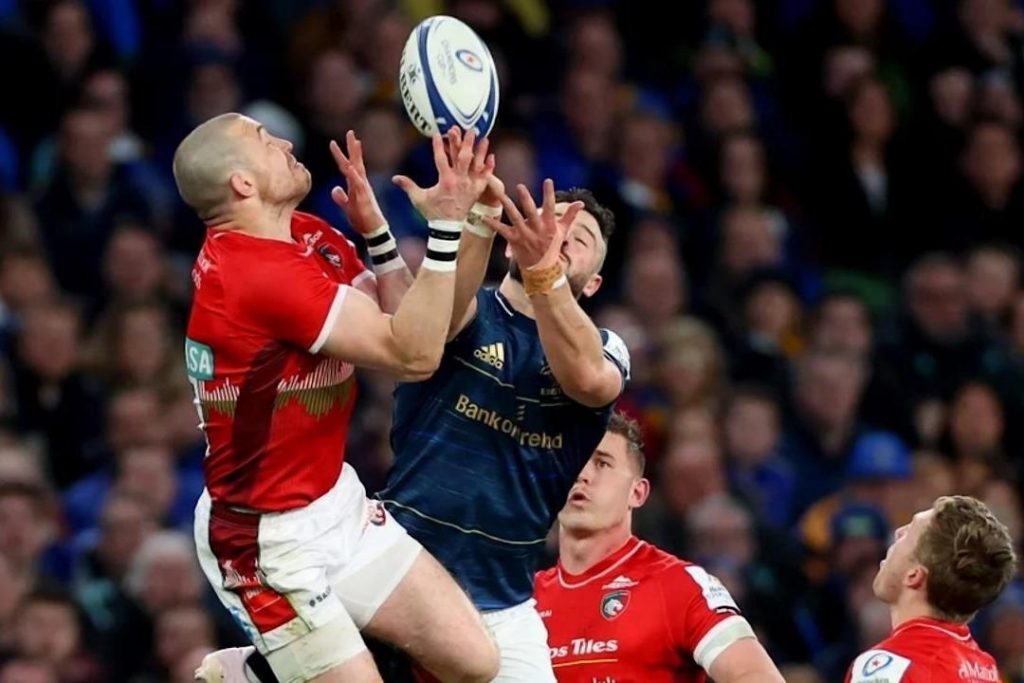 Leinster and Leicester players jumping for the ball