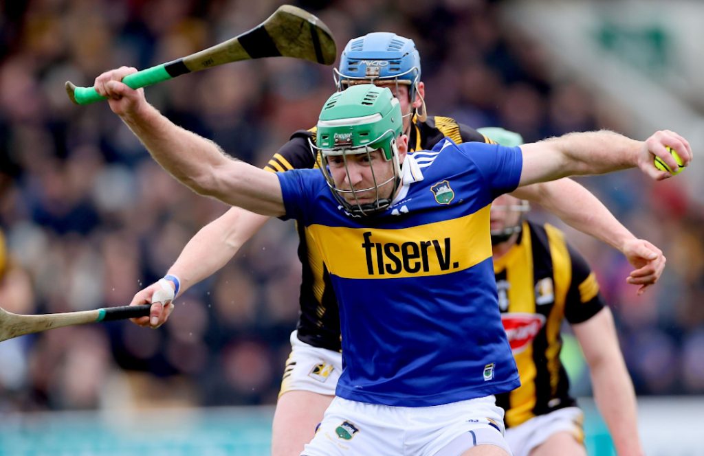 Tipperary GAA player holding a hurley and sliotar 