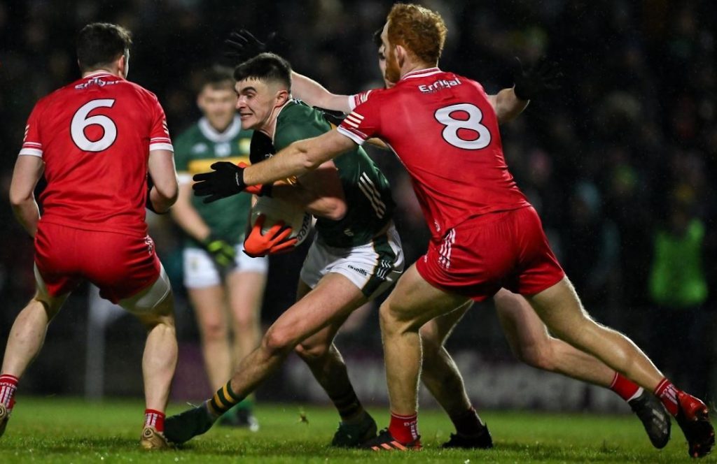 Derry GAA players trying to tackle Kerry