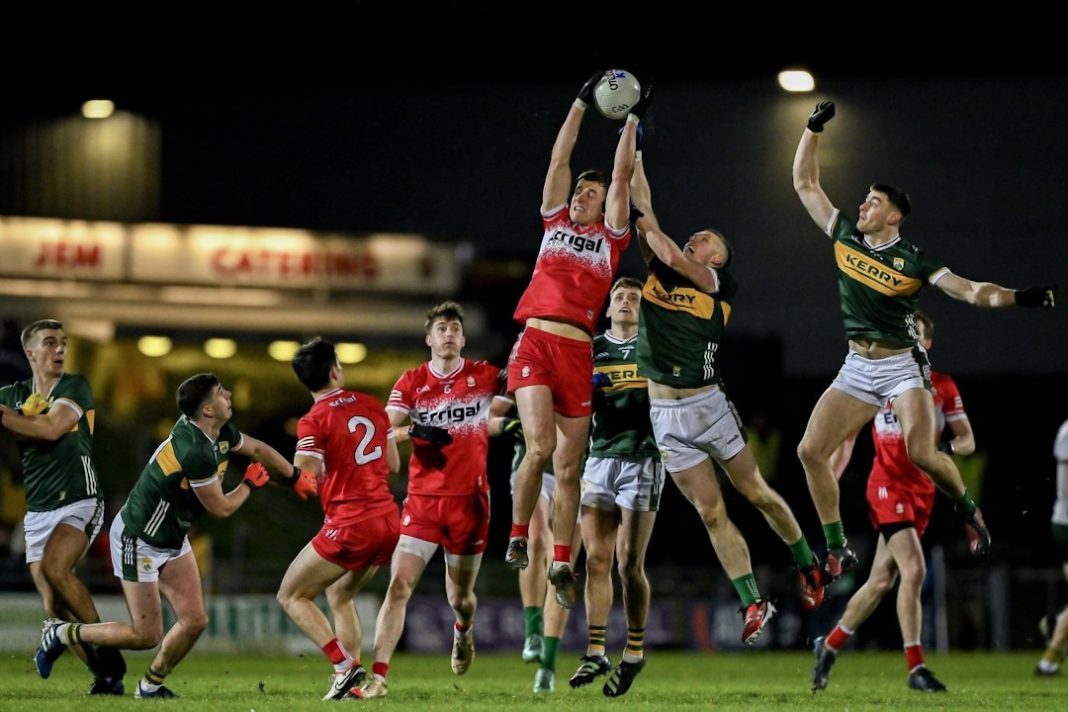 Kerry GAA and Derry players going for a ball in the air
