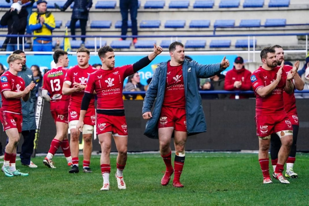 Scarlets Rugby players reacting to defeat