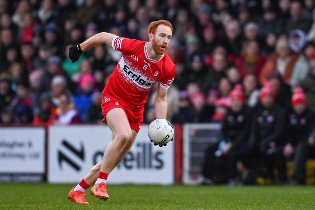 A photo of GAA star Conor Glass with the ball during a game