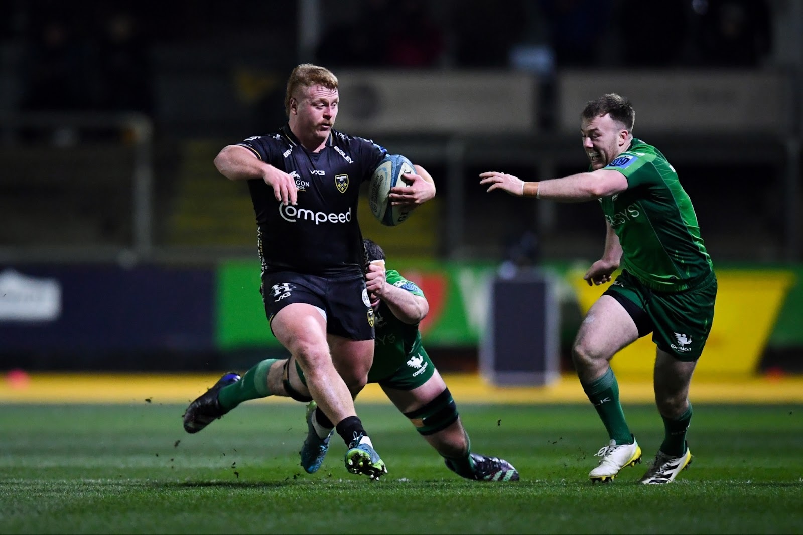 Dragons Rugby player avoiding a tackle