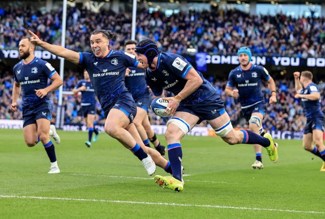 Leinster Rugby players running in a score