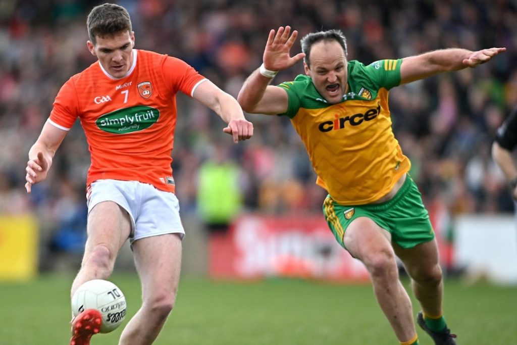 Armagh Gaelic footballer dribbling