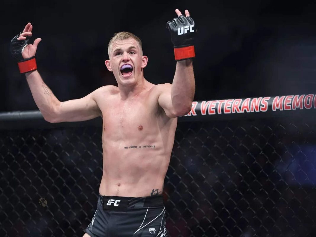 Ian Garry reacting inside the octagon