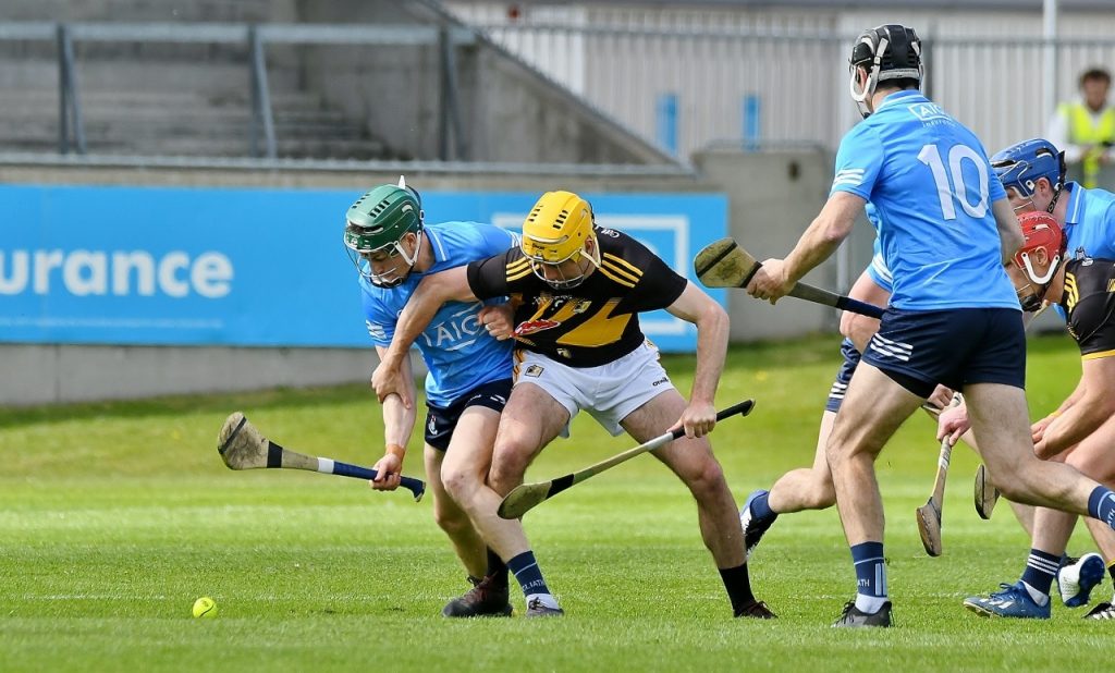 Kilkenny and Dublin players scramble for the sliotar