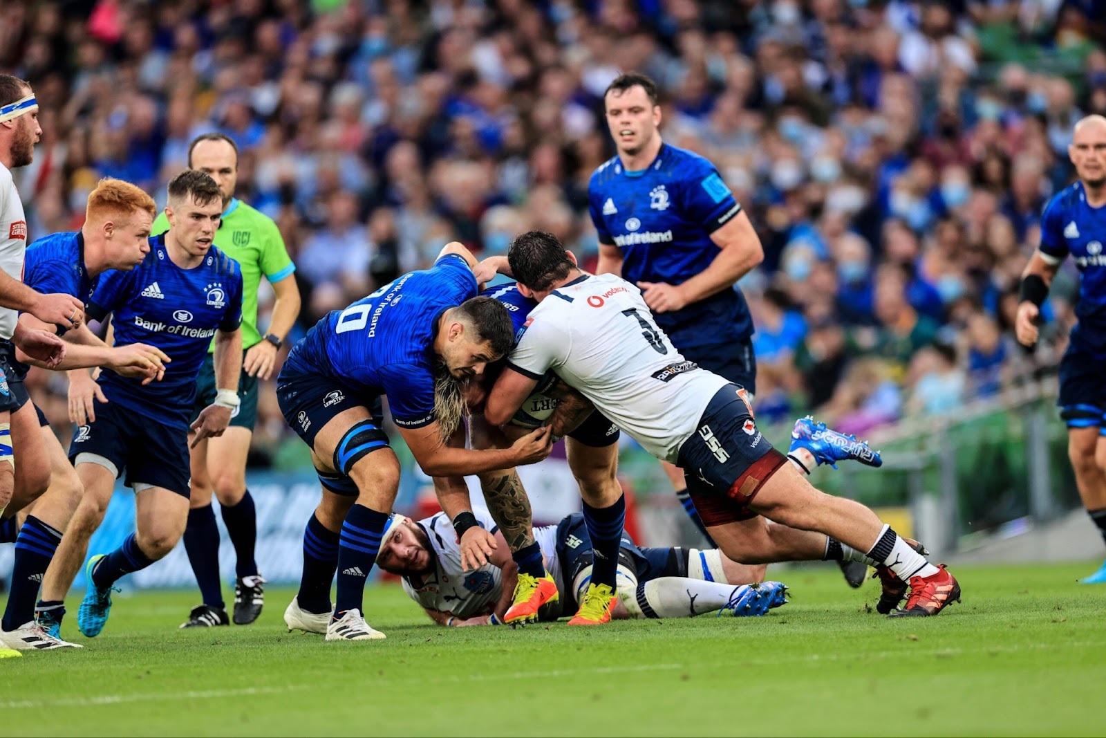 Leinster players getting tackled by Vodacom Bulls players