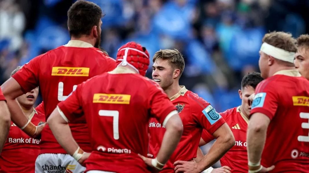 Munster rugby players discussing among themselves after another poor performance