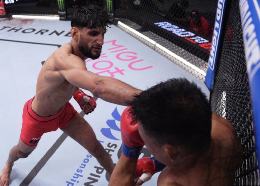 Kiru Singh Sahota fighting in the Octagon