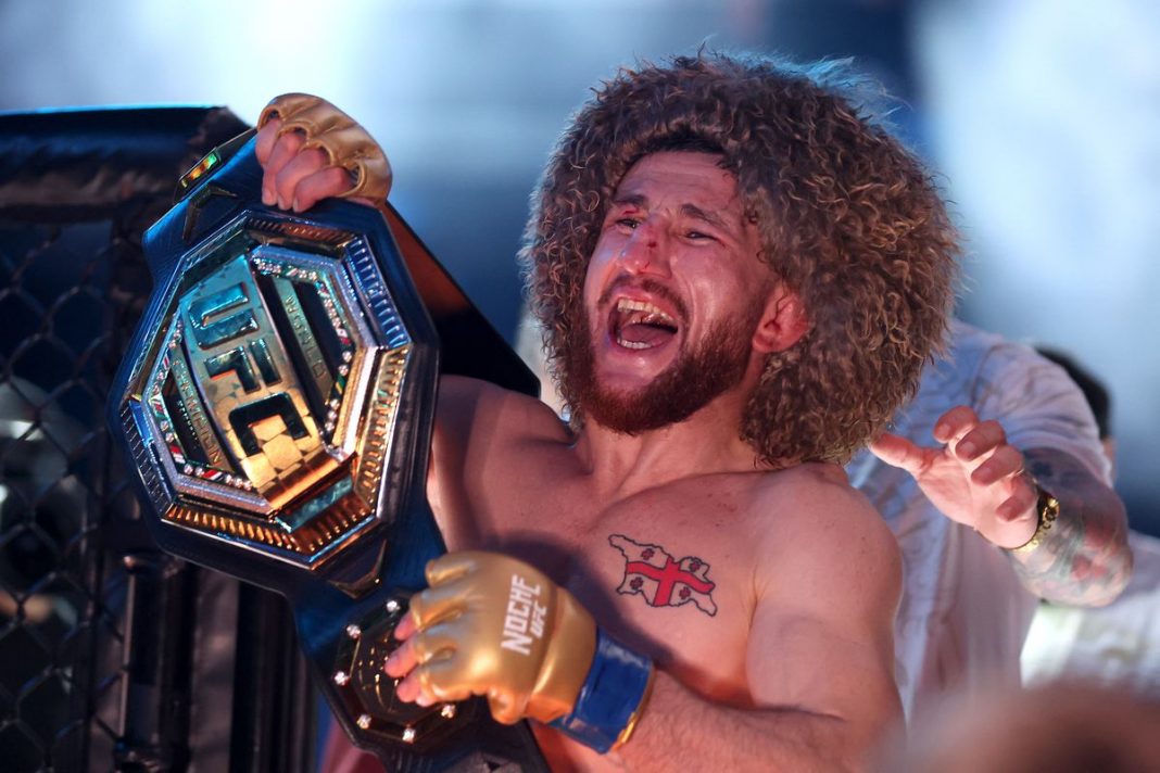Merab Dvalishvili celebrating his title win.