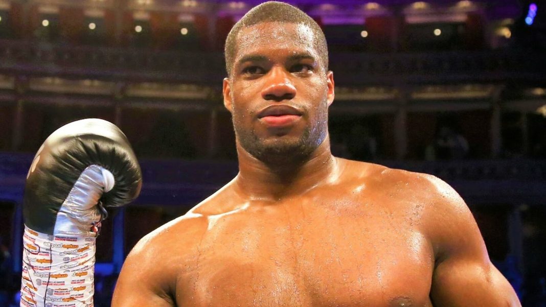 Daniel Dubois celebrating a win in the boxing ring