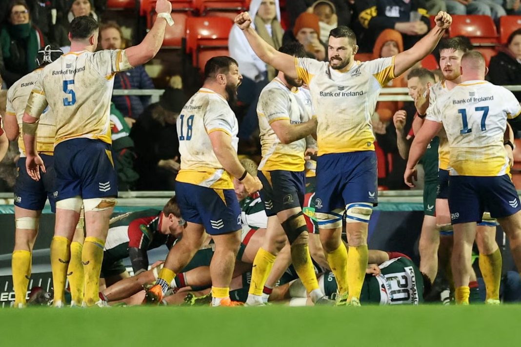 Leinster rugby players celebrating a score