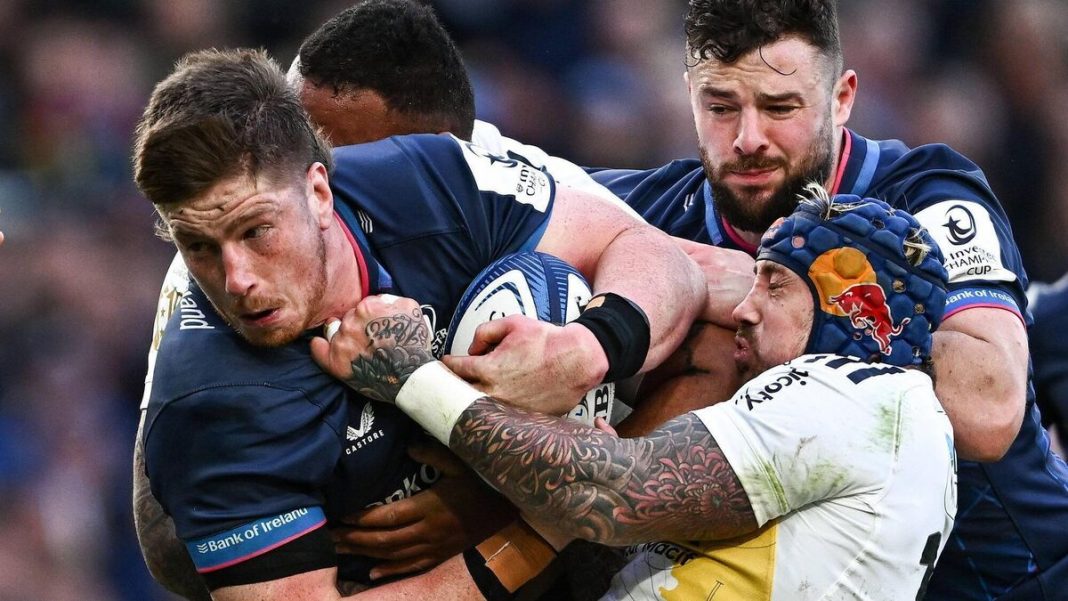 Joe McCarthy of Leinster is tackled by Jack Nowell of La Rochelle