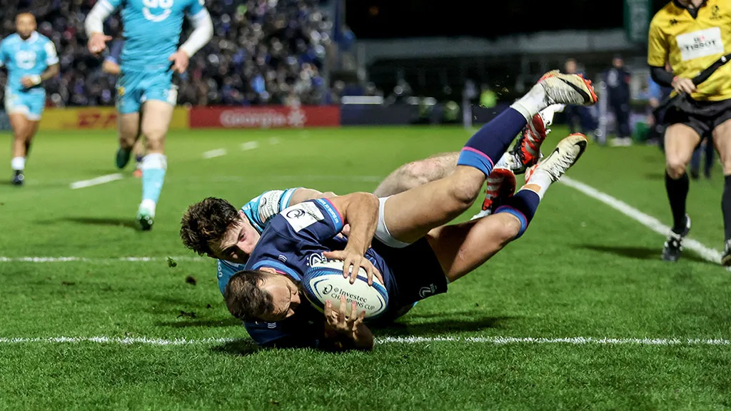 Rugby player scoring a try
