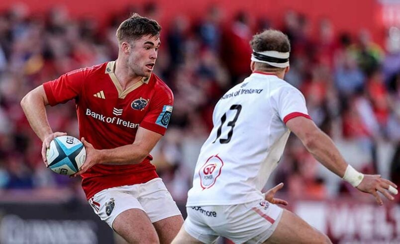 Munster Rugby player running with the ball