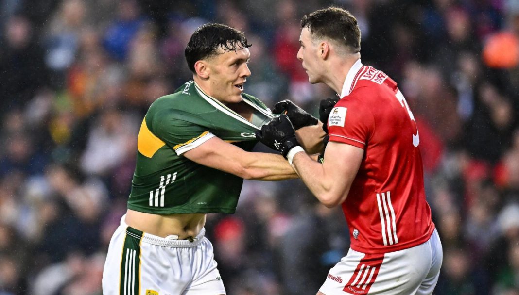 Kerry player wrestling in a GAA match
