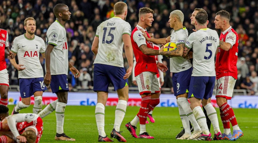 Arsenal and Spurs players squaring off in a North London Derby